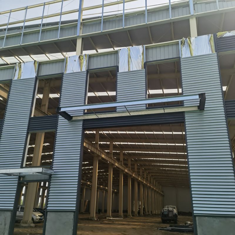 Construir armazém de aço projetado para alta altura e grande comprimento com oficina de estrutura de aço pré-fabricada à prova de furacões